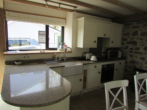 Eco-friendly domestic kitchen cleaning in Ammanford – modern farmhouse kitchen professionally cleaned by The Moppit Show